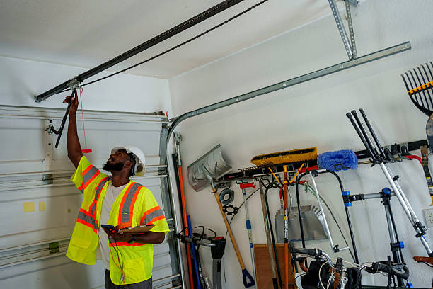 Professional Garage Door technician working in West Sand Lake, NY